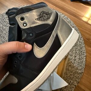 Nike Black and Silver Air Jordans